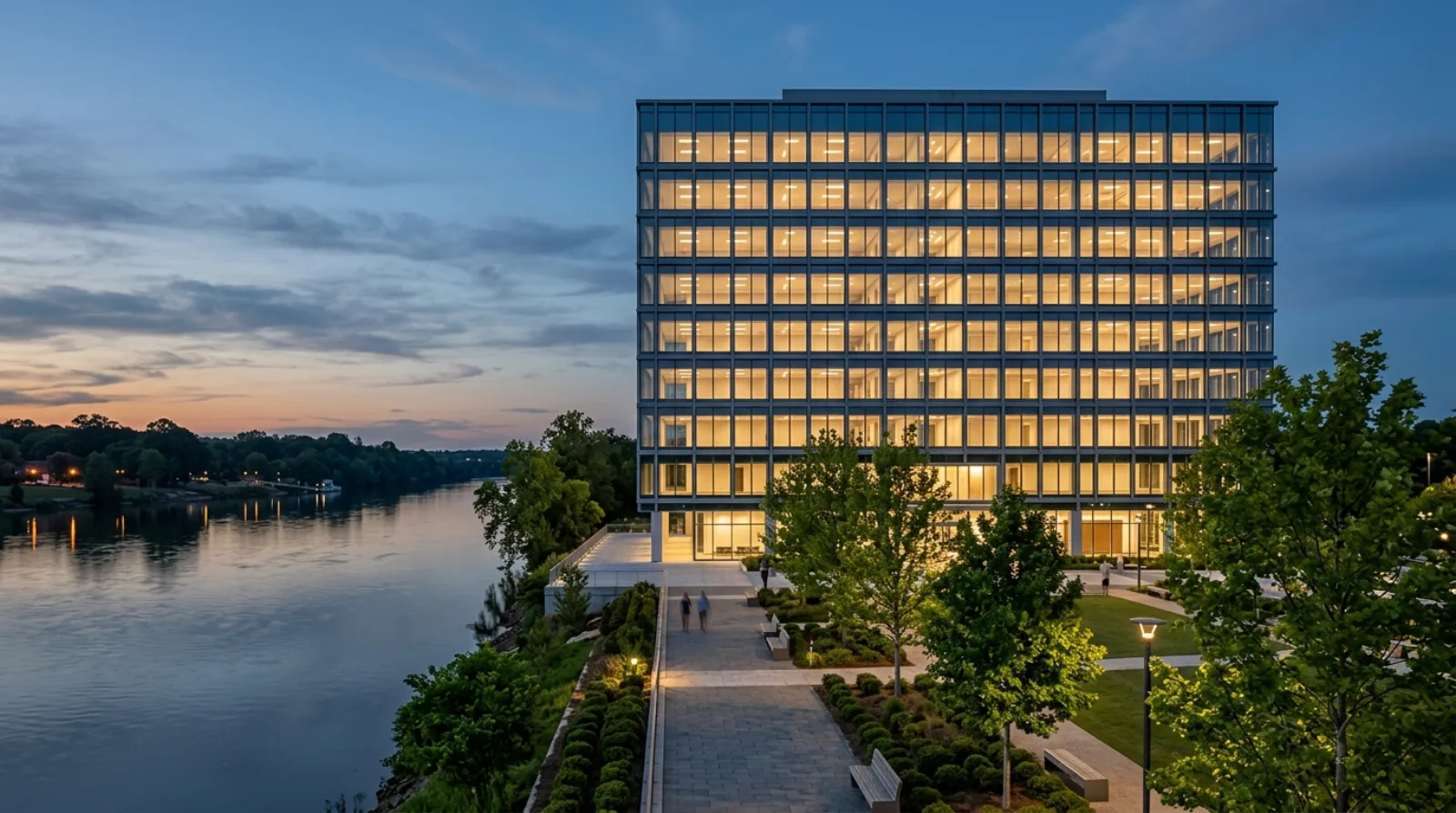 Modern glass office buildings on the Augusta riverfront at dusk